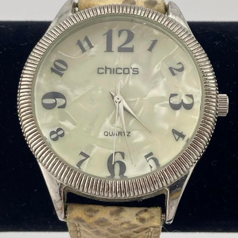 CHICO’S Women's Quartz Watch with Beige Snake-Print Leather Strap. It has a styl